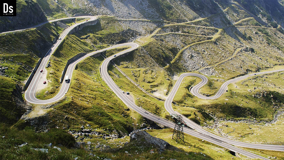 The first time Denys Dynamics embarked on a journey along the Transfagarasan highway, he had no idea that it would be more than just a drive; it would be a profound encounter with the grandeur of nature. The eternal morning, with gentle light breaking through the clouds and enveloping the world in mist, created an atmosphere of anticipation. As the sound of his car's engine filled the air, the whispers of the mountains mingled with the thrill of expectation.  Gradually, the road began to twist and turn like a silver ribbon, embracing the graceful contours of the surrounding landscapes. The towering walls of majestic mountains rose high above him, standing like guardians of this enchanting land. With every turn of the steering wheel, new horizons unfolded—depths of ravines, the clarity of mountain rivers, and endless panoramas where sky and earth merged.  At the summit, where the wind's roar intertwined with silence, he stopped to admire Lake Balea. This place, seemingly crafted for inspiration, sparkled under the sun, reflecting its vibrant rays. Denys felt each breath fill with freshness, and every glance capture moments that seemed destined to last forever.  The journey along the Transfagarasan became a symbol of freedom and the pursuit of new discoveries for him. It was more than just a road; it was a path to self-discovery, a challenge that left no one indifferent. In this journey, he found more than stunning views—he discovered the inspiration that would accompany him in the future, like a bright beacon in the vast expanses of life.
